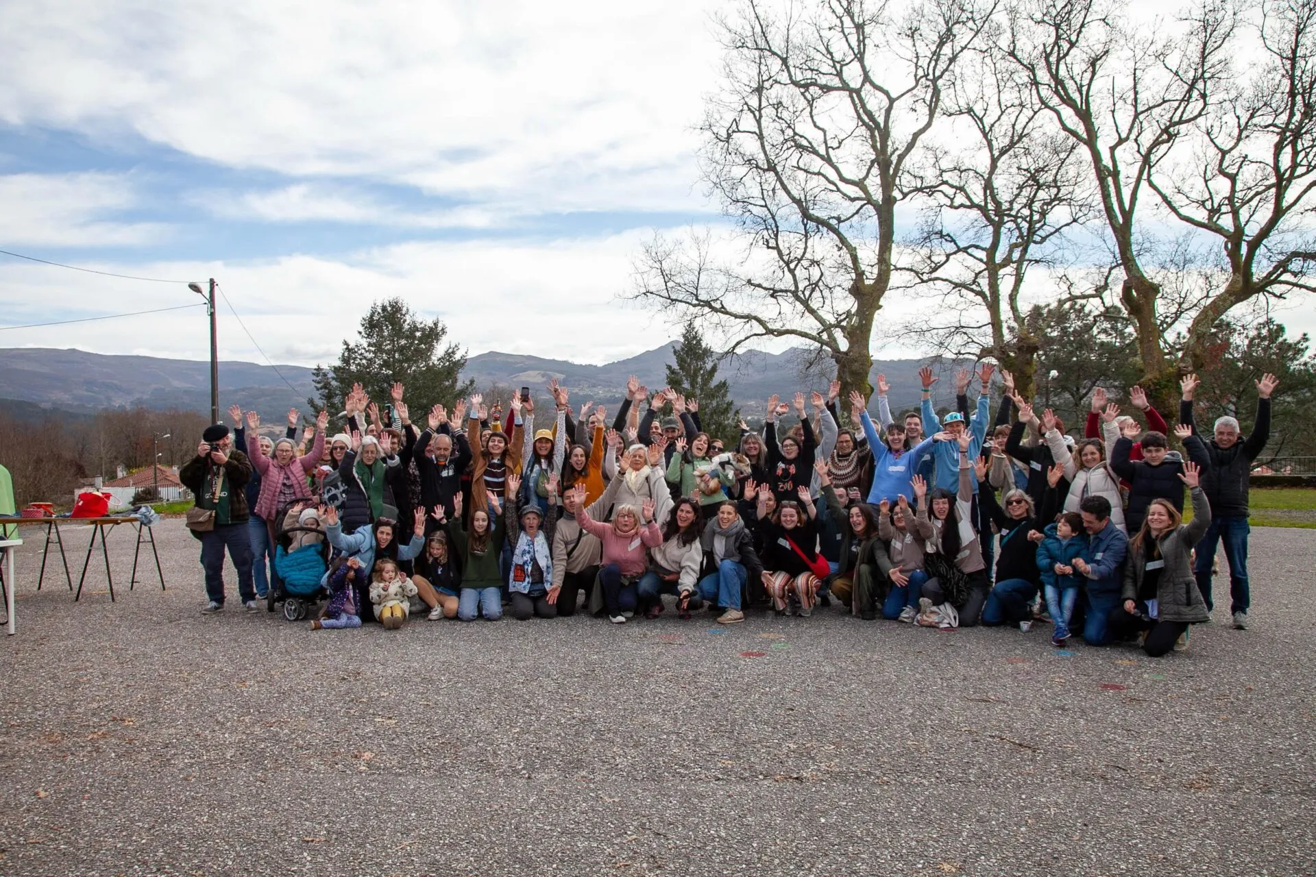 Group of people gathered outdoors at Anceu Coliving in rural Galicia for Season 7