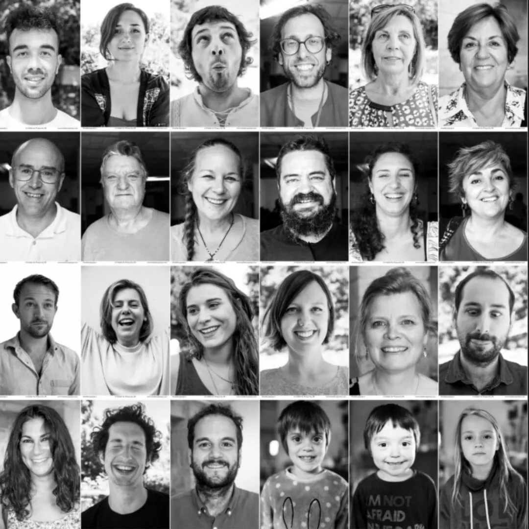 Grid of twenty-four black-and-white portraits of people of all ages, smiling and pulling faces