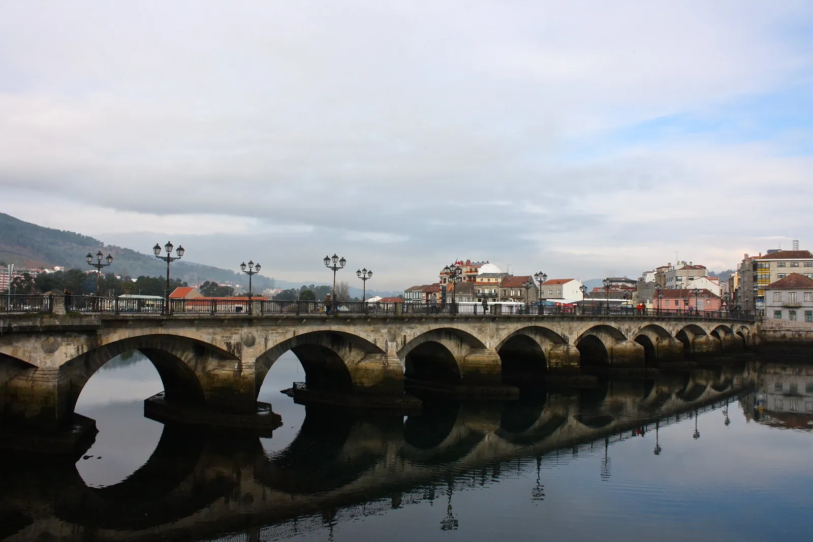 The bridge and waterfront of Pontevedra, the final train and coach stop before Anceu